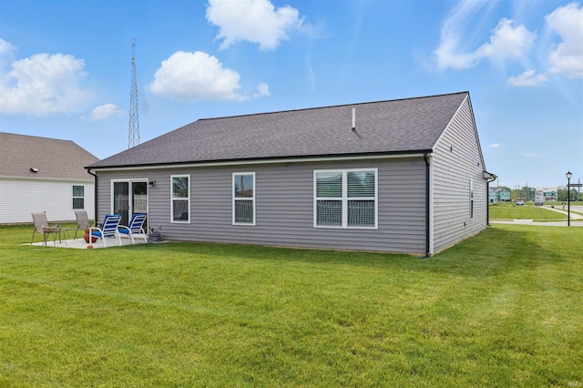 3436 Fawn Creek Blvd, Waterloo, IN 46793 - back of house with a patio, a yard, and a shingled roof