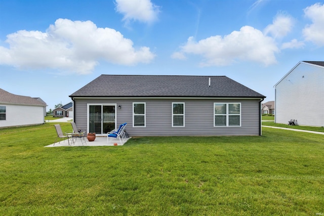 3436 Fawn Creek Blvd, Waterloo, IN 46793 - rear view of property with a patio area, a yard, and a shingled roof