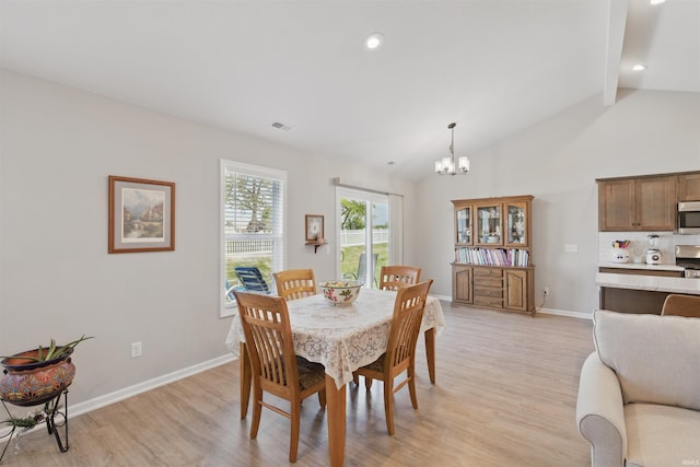 3436 Fawn Creek Blvd, Waterloo, IN 46793 - dining area with light wood finished floors, a chandelier, baseboards, beamed ceiling, and high vaulted ceiling