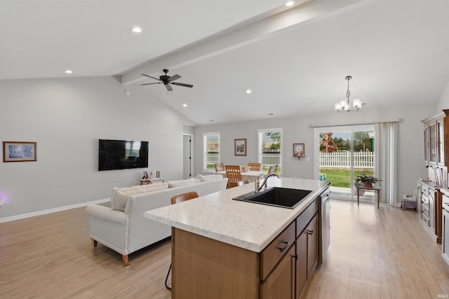 3436 Fawn Creek Blvd, Waterloo, IN 46793 - kitchen with a sink, light wood-style floors, dishwasher, an island with sink, and open floor plan