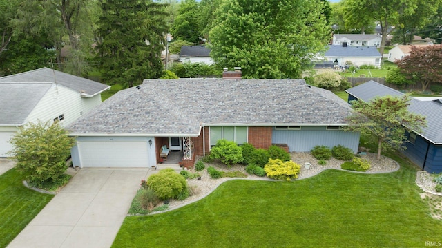 4112 Hiawatha Blvd, Fort Wayne, IN 46809 - ranch-style home featuring a garage, a front yard, and driveway