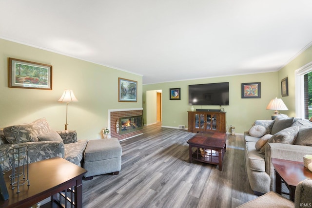 4112 Hiawatha Blvd, Fort Wayne, IN 46809 - living room featuring ornamental molding, wood finished floors, a fireplace, and baseboards