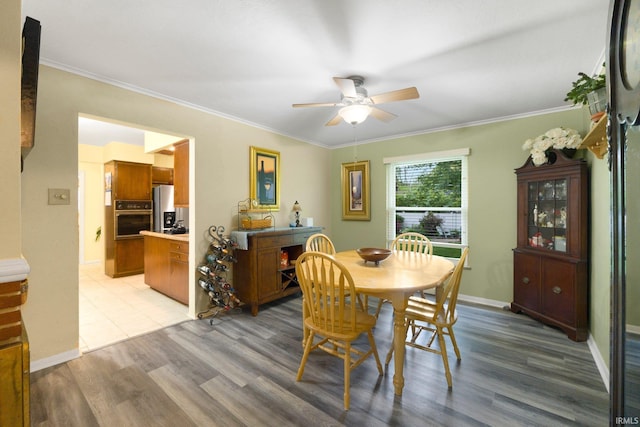 4112 Hiawatha Blvd, Fort Wayne, IN 46809 - dining space with ceiling fan, light wood-type flooring, ornamental molding, and baseboards