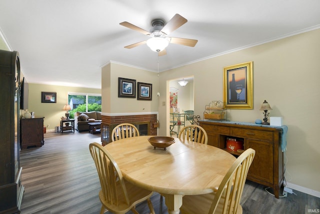 4112 Hiawatha Blvd, Fort Wayne, IN 46809 - dining space featuring dark wood finished floors, ceiling fan, baseboards, and crown molding