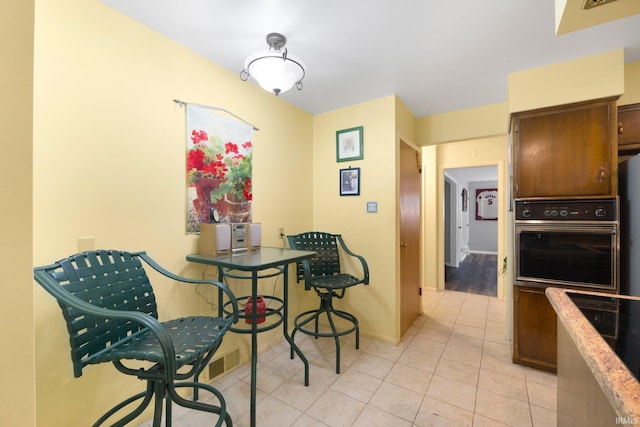 4112 Hiawatha Blvd, Fort Wayne, IN 46809 - dining space with light tile patterned flooring and baseboards