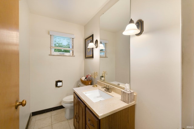 4112 Hiawatha Blvd, Fort Wayne, IN 46809 - half bath with vanity, toilet, tile patterned floors, and baseboards