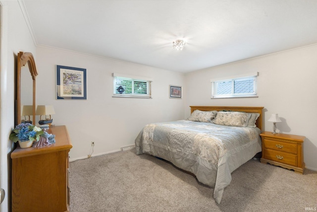 4112 Hiawatha Blvd, Fort Wayne, IN 46809 - carpeted bedroom featuring multiple windows, crown molding, baseboards, and baseboard heating