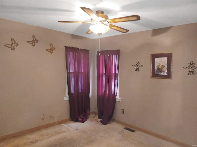 2550 N Kentucky Ave, Evansville, IN 47711 - unfurnished room with a ceiling fan, carpet flooring, and baseboards