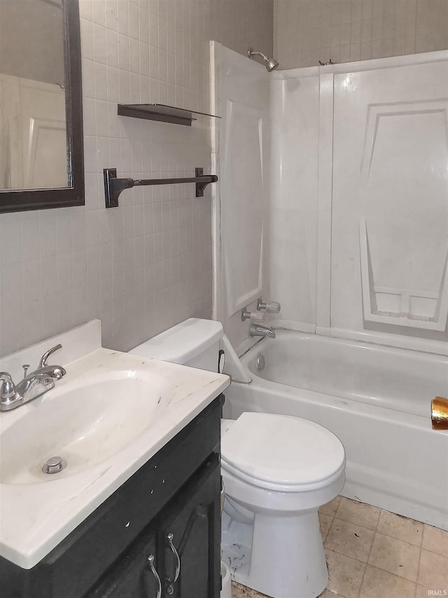 2550 N Kentucky Ave, Evansville, IN 47711 - bathroom with  shower combination, toilet, vanity, and tile patterned flooring