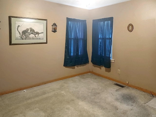 2550 N Kentucky Ave, Evansville, IN 47711 - carpeted empty room with baseboards