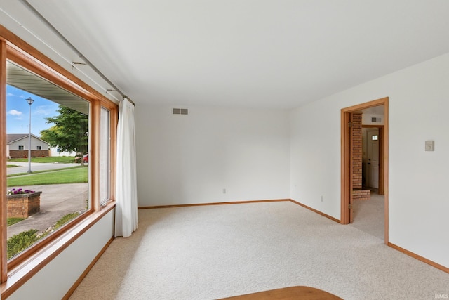 928 Hollyhill Dr, Fort Wayne, IN 46819 - unfurnished room with light carpet and baseboards