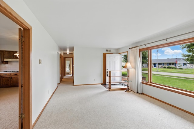 928 Hollyhill Dr, Fort Wayne, IN 46819 - unfurnished room featuring light colored carpet and baseboards