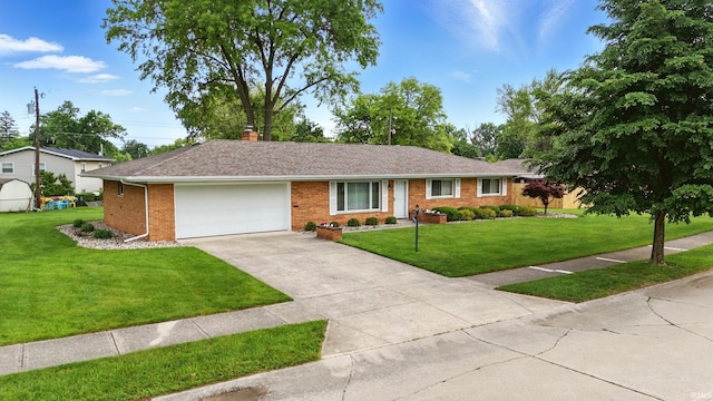 928 Hollyhill Dr, Fort Wayne, IN 46819 - ranch-style house with a garage, brick siding, a front lawn, and concrete driveway