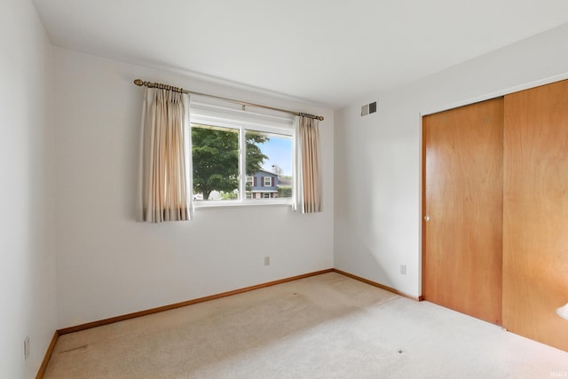 928 Hollyhill Dr, Fort Wayne, IN 46819 - unfurnished bedroom with carpet floors, a closet, and baseboards
