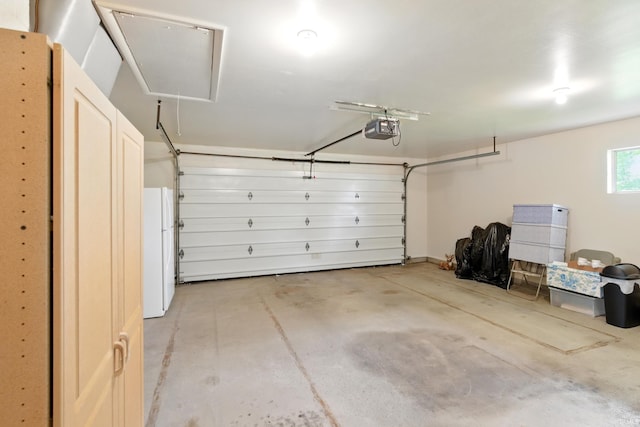 928 Hollyhill Dr, Fort Wayne, IN 46819 - garage with freestanding refrigerator and a garage door opener