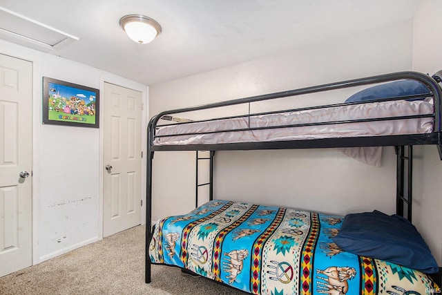402 W Waterford St, Wakarusa, IN 46573 - carpeted bedroom featuring attic access and baseboards
