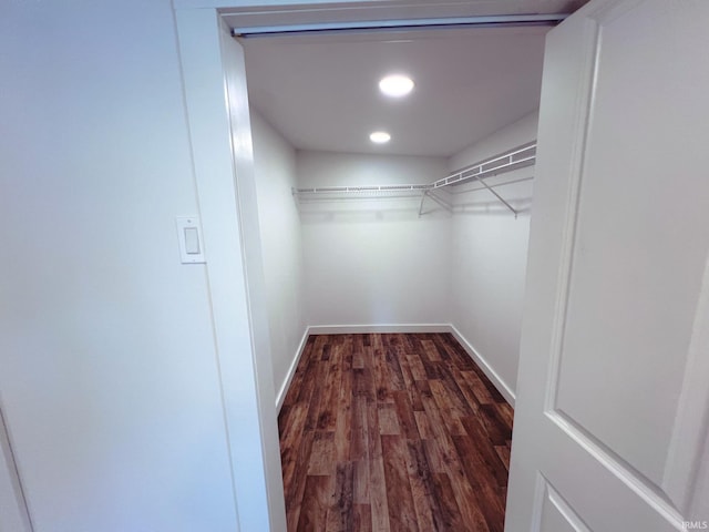 202 E Vine St, Mitchell, IN 47446 - spacious closet with dark wood-type flooring