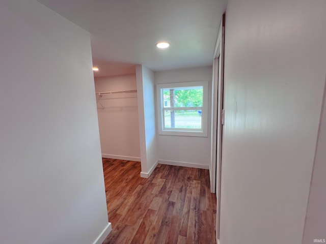 202 E Vine St, Mitchell, IN 47446 - corridor with baseboards, wood finished floors, and recessed lighting
