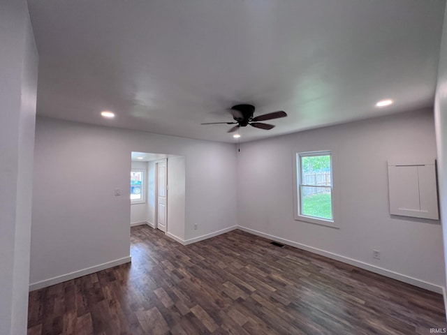 202 E Vine St, Mitchell, IN 47446 - empty room with recessed lighting, ceiling fan, dark wood-type flooring, and baseboards