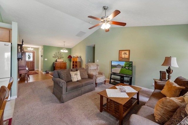 354 Kettle Cir, Lafayette, IN 47905 - living room with a chandelier, light carpet, ceiling fan, baseboards, and vaulted ceiling