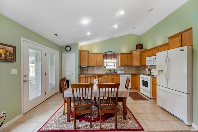 354 Kettle Cir, Lafayette, IN 47905 - dining area featuring vaulted ceiling, recessed lighting, light tile patterned floors, and baseboards