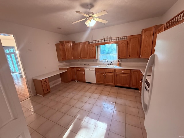 53172 Bracken Fern Dr, South Bend, IN 46637 - kitchen featuring white appliances, a sink, light countertops, and a ceiling fan