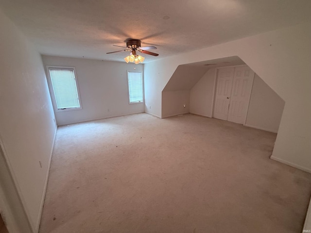 53172 Bracken Fern Dr, South Bend, IN 46637 - bonus room featuring ceiling fan, light colored carpet, and baseboards