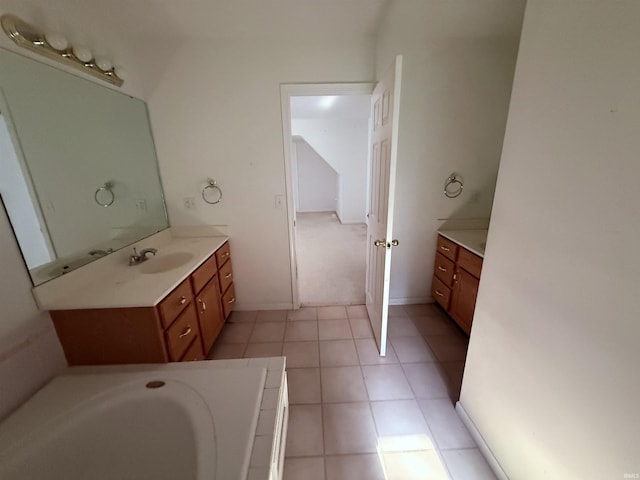 53172 Bracken Fern Dr, South Bend, IN 46637 - full bathroom featuring vanity, a tub, and tile patterned floors