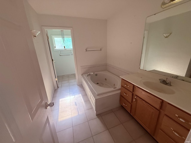 53172 Bracken Fern Dr, South Bend, IN 46637 - bathroom featuring vanity, tile patterned flooring, and a whirlpool tub