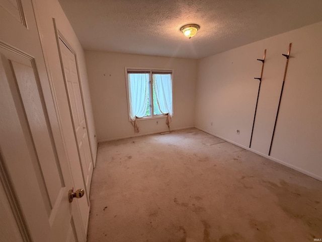 53172 Bracken Fern Dr, South Bend, IN 46637 - unfurnished bedroom featuring a textured ceiling and baseboards