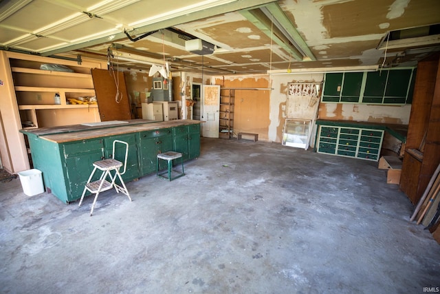 401 S Plymouth St, Culver, IN 46511 - garage featuring a garage door opener