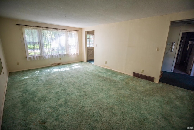 401 S Plymouth St, Culver, IN 46511 - carpeted empty room featuring baseboards