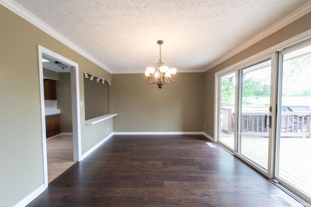 604 W Soutar Dr, Bloomington, IN 47403 - unfurnished room featuring a chandelier, a textured ceiling, crown molding, wood finished floors, and baseboards