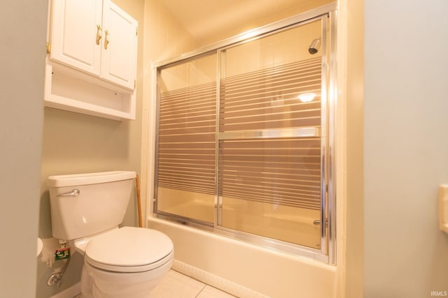 604 W Soutar Dr, Bloomington, IN 47403 - full bathroom featuring toilet, enclosed tub / shower combo, and tile patterned floors
