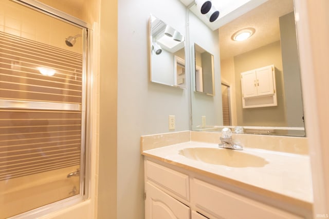 604 W Soutar Dr, Bloomington, IN 47403 - full bathroom with vanity and shower / bath combination with glass door