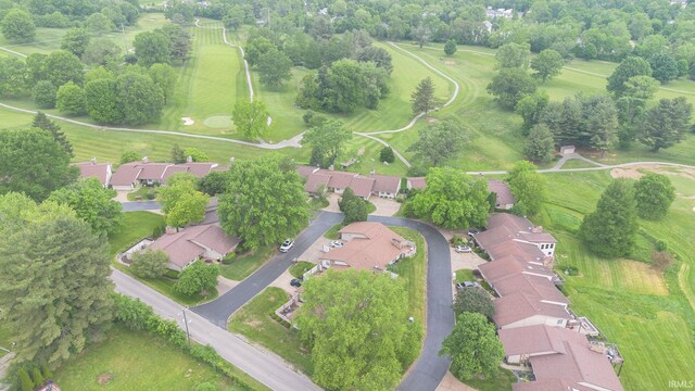 604 W Soutar Dr, Bloomington, IN 47403 - aerial view of property and surrounding area with a tree filled landscape and nearby suburban area
