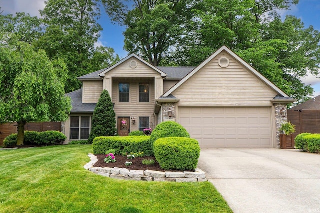 15025 Water Oak Pl, Huntertown, IN 46748 - view of front of home with concrete driveway, a garage, a front lawn, and a shingled roof