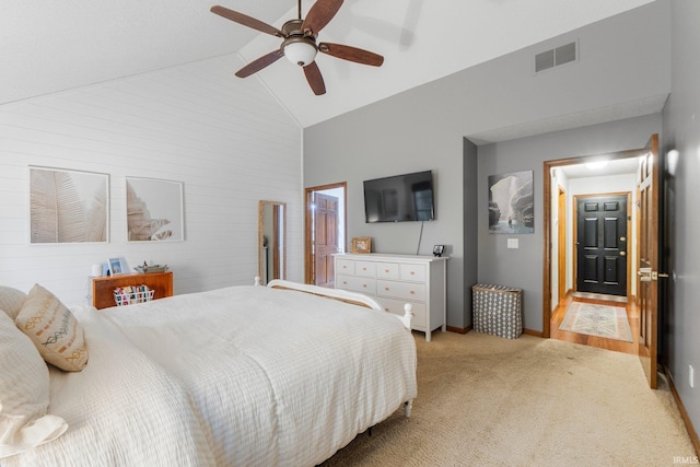 15025 Water Oak Pl, Huntertown, IN 46748 - bedroom with light colored carpet, baseboards, high vaulted ceiling, and a ceiling fan