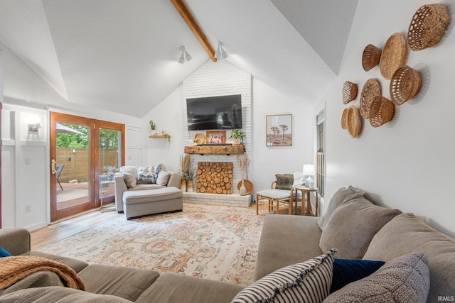 15025 Water Oak Pl, Huntertown, IN 46748 - living area featuring wood finished floors and a fireplace