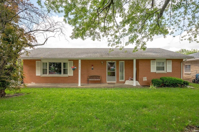 3106 W Brook Dr, Muncie, IN 47304 - ranch-style house with a front lawn and brick siding