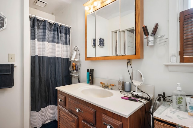 3106 W Brook Dr, Muncie, IN 47304 - bathroom with vanity and curtained shower