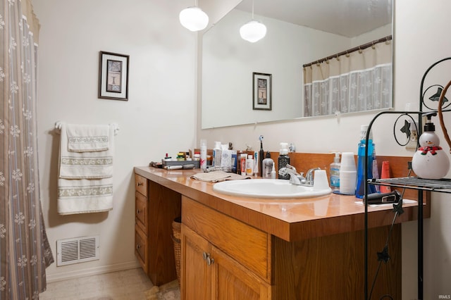 3106 W Brook Dr, Muncie, IN 47304 - bathroom with vanity and baseboards