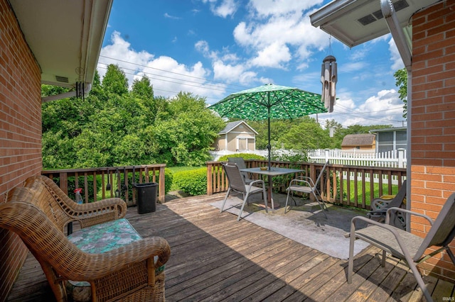 3106 W Brook Dr, Muncie, IN 47304 - deck with outdoor dining area