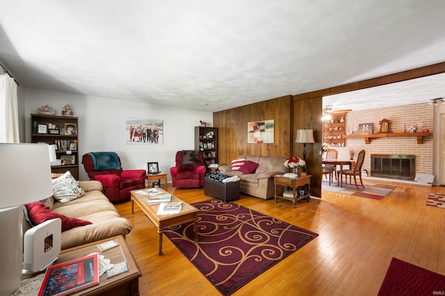 3106 W Brook Dr, Muncie, IN 47304 - living room with hardwood / wood-style flooring and wood walls