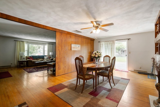 3106 W Brook Dr, Muncie, IN 47304 - dining room with healthy amount of natural light, ceiling fan, and light wood finished floors