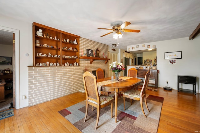 3106 W Brook Dr, Muncie, IN 47304 - dining room featuring light wood-style flooring and ceiling fan