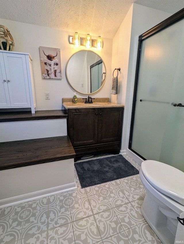 1406 N 800 E, Greentown, IN 46936 - full bathroom featuring a textured ceiling, vanity, toilet, a stall shower, and tile patterned flooring