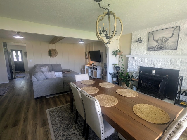 1406 N 800 E, Greentown, IN 46936 - dining area featuring wood finished floors, beamed ceiling, a textured ceiling, and a chandelier