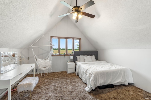 2395 State Road 427th Hwy, Waterloo, IN 46793 - bedroom featuring a textured ceiling, lofted ceiling, carpet flooring, and a ceiling fan