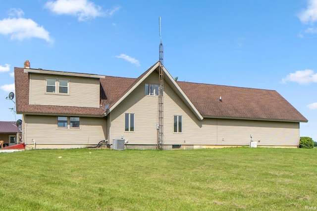 2395 State Road 427th Hwy, Waterloo, IN 46793 - rear view of property with roof with shingles, cooling unit, and a lawn
